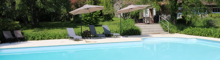 Private pool with sun loungers at Beaux Souvenirs adults-only gîte in Mialet, Dordogne