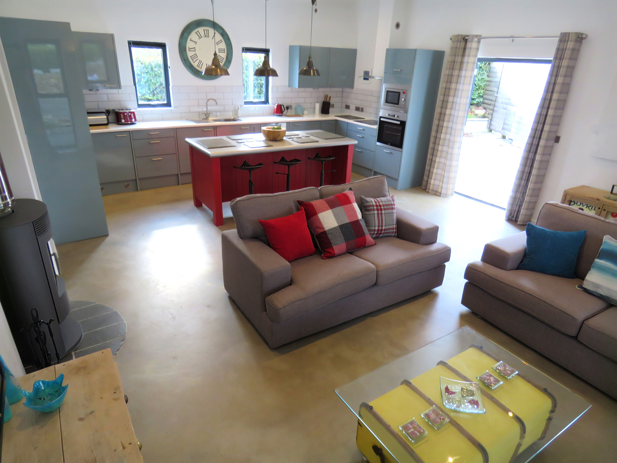 Bright contemporary well equipped kitchen and dining area in Sienna