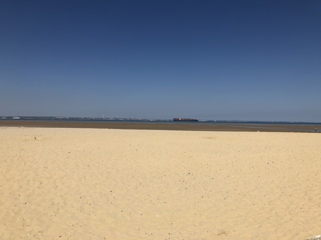 Ryde seafront and sandy beach with Ryde Pier stretching into the Solent